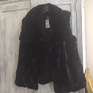 Black faux fur vest